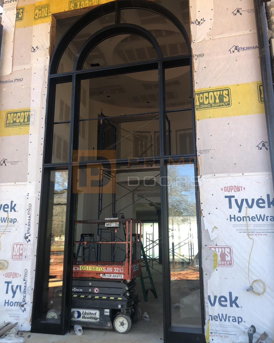 Oversized Iron Doors with Glass and Transoms Houston TX