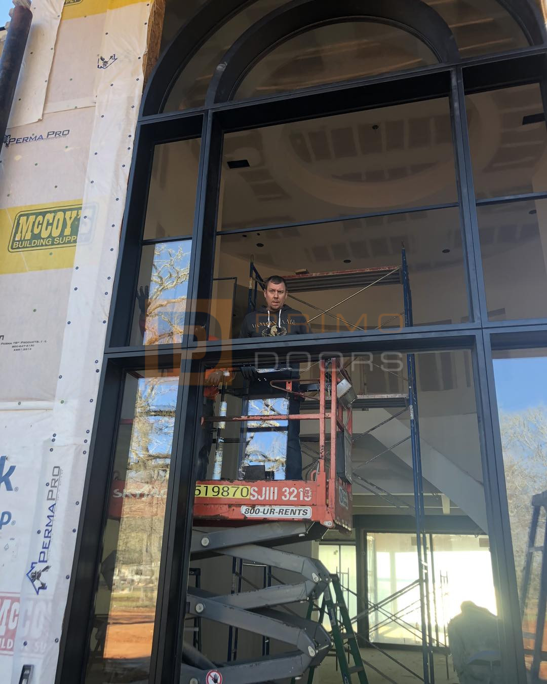 Oversized Iron Doors with Glass and Transoms Houston TX