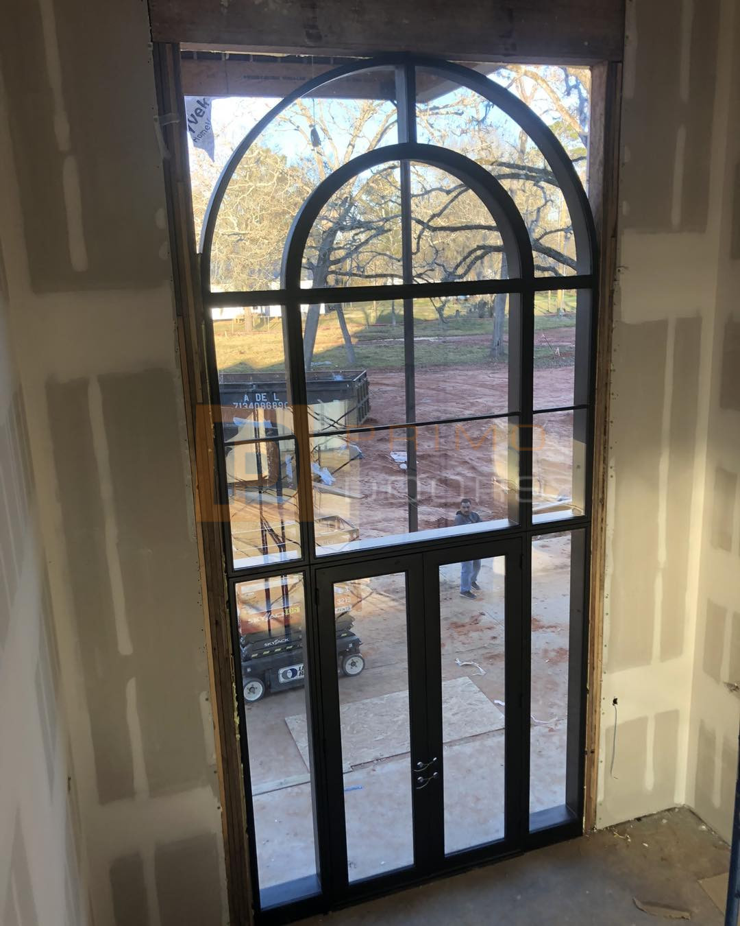 Oversized Iron Doors with Glass and Transoms Houston TX
